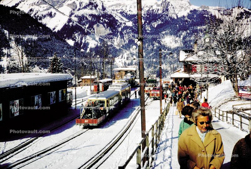 Passengers, snow, ice, cold, station, Wengen, 1950s