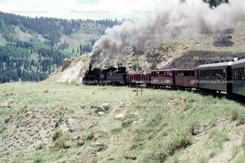D&RGW locomotive 487, (Narrow Gauge), 2-8-2, passenger railcars, smoke, July 1990