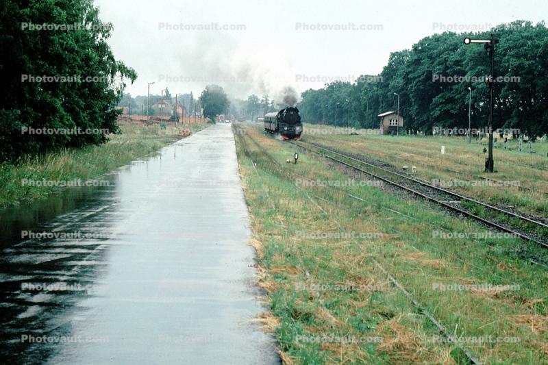 Wet Road, rain, railroad tracks