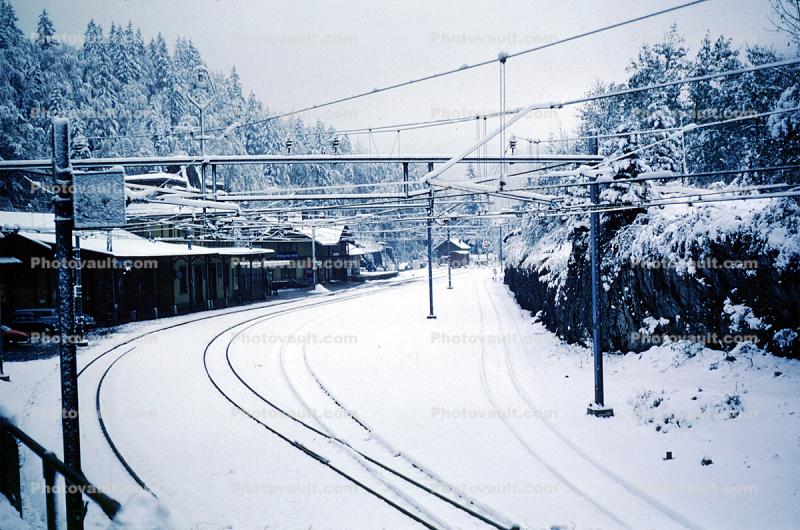 Bruning Pass, town, train station, tracks, Swiss Alps, October 1964