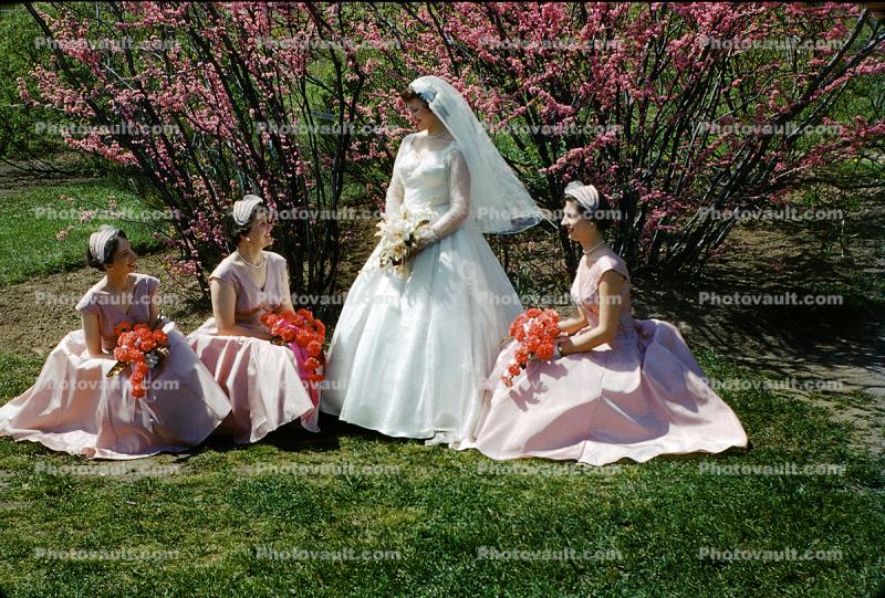 Bride with her Bridesmaids, flowers, 1940s