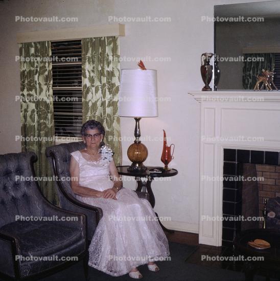 Grandma Sitting in Chair, corsage, lamp, table, 1950s, Hobart Indiana