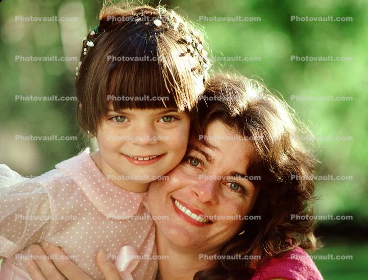 Smiling Mother and Daughter
