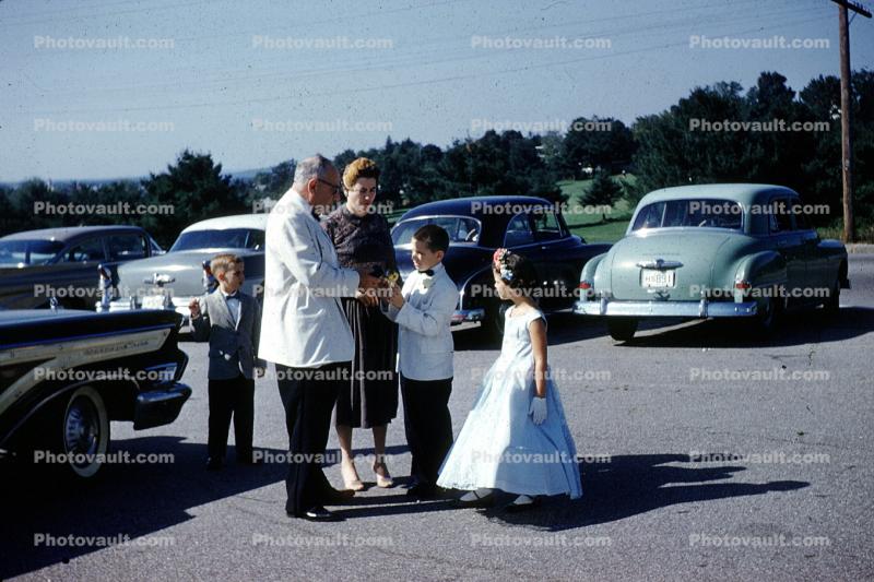Cars, girl, boy, grandma, grandpa, grandparents, grandmother, vehicles, September 1959, 1950s