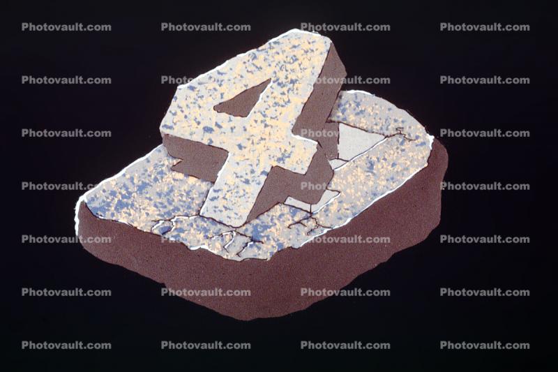 Number Four, title, embedded in Rock, Granite