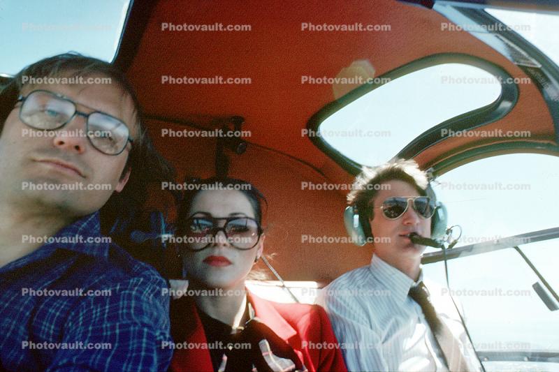 Wendy Linka, Wernher Krutein, Jim the pilot in a helicopter