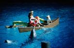 Woman on a Boat, lei, dolphins, outrigger