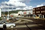 Hougens, Main Street, buildings, cars, automobile, vehicle, shops, stores, Whitehorse, 1960s, CCYV01P06_10