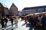 people, jackets, coats, cold, buildings, outdoor market, coblestone street, Nurnberg
