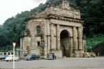 arch, landmark, woody, car, vehicle, automobile