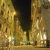 Nightime in the shopping district, stores, buildings, Florence