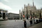 Milan Cathedral (Italian: Duomo di Milano), cars, taxi, women, building, 1950s, CEIV10P15_14