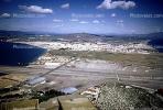 air strip, no mans land and spanish town of La Linea from observatiion point at north end of rock, April 1967, 1960s