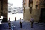 Cobblestone Street, buildings, men, walking, 1940s, CEOV03P08_07