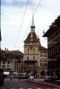 Clock Tower, Trolley, Prison Tower, (Kafigturm), tracks, buildings, cobblestone, oldtown, Bern, Switzerland, CESV02P05_02
