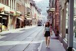Woman Walking, Sidewalk, Geneva, Switzerland
