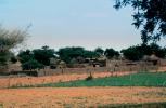 village, wall, farm field, desert, buildings, Diomga, Province de l? Oudalan, Sahel desert, CJFV01P01_16