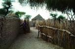 Village, walls, desert, woman drought, Diomga, Province de l? Oudalan, Sahel desert