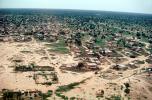 Flying over Ouagadougou, cityscape, desert, sand