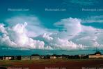 Cumulonimbus Clouds, village, buildings, houses, Fada-Ngourma, Gourma province, CJFV01P02_14.1725