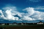 Cumulonimbus Clouds, village, buildings, houses, Fada-Ngourma, Gourma province, CJFV01P02_14
