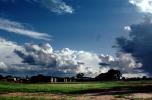Cumulonimbus Clouds, village, buildings, houses, Fada-Ngourma, Gourma province, CJFV01P02_17