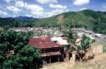 Village, rusty tin roof, buildings, homes, houses, mountains, jungle, CKDV01P05_17