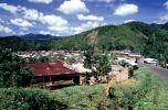 Village, rusty tin roof, buildings, homes, houses, mountains, jungle, CKDV01P05_18