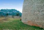 Great Zimbabwe Ruins, Stone Wall, fields, trees, mountain, CKZV01P04_02.1725