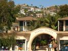 Panno Plaza, Arch, Building, Hills, trees