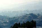 hills layered in smog, haze, air pollution, buildings, homes, houses, Dystopia