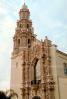 Ornate Church Building, Bell Tower, Saint Vincent de Paul Catholic Figueroa Street, Los Angeles, opulant, floral motifs, scrollwork, Churrigueresque ornamentation 