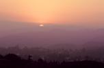 Sunset, layered hills, smog