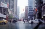 taxi cab, street lights, rain, inclement weather, slick, downpour, cars, automobiles, vehicles