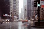 cars, automobiles, vehicles, rain, inclement weather, slick, downpour, CLCV04P10_10
