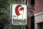 The Redhead Piano Bar, signage, wink, winking