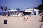 Chicago, sand, beach, buildings, palm trees, garbage can, girls sitting, CLCV09P04_03