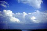 Atachafalaya River, pure sky, cumulus clouds, CMLV01P15_10