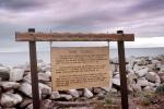 Nome Seawall Sign, Rocks, Horizon
