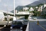 Sourdough Bar and Liquor Store, Tunnel, Phone Booth, dodge van, cars, houses, vehicles, automobiles,  Ketchikan,  July 1969