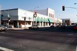Topper, Buildings, stores, cars, street, awning, traffic light, Shops, Christmas decorations, intersection, road, Modesto, December 1988, 1980s, CNCV02P11_09