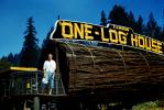 Famous One Log House, woman, Garberville, Humboldt County, 1950s