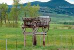 Freight Wagon, mountains, Fields, fence, wheels, hills, cartwheel, Madison Range Montana, CNMV01P02_09.1733