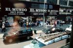 El Mundo, cars, shoppers, shops, store, ladder, 26 June 1999, CNYV07P01_07