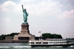 Statue Of Liberty and the Circle Line ferries, boat, flag