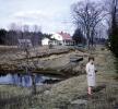 Woman, pond, house, home, building, bare trees, winter, Saratoga Springs, CNZV01P09_08