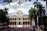 Iolani Palace, The state capital building, clock tower, palm trees