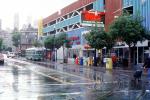 Trolley Stop, Parking Garage, buildings, street, tracks, rain, wet