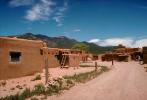 Ladders, walls, dirt road, Mountain Range, Pueblo de Taos, CSMV01P01_12.1743