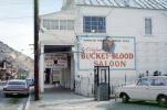 Bucket of Blood Saloon, Cars, vehicles, Automobile, building, phone booth, rambler, sign, Virginia City, June 1967, 1960s, CSNV06P07_13